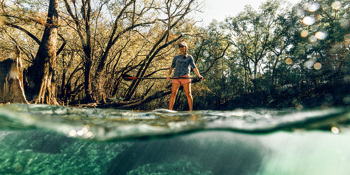 backwater river paddleboarder