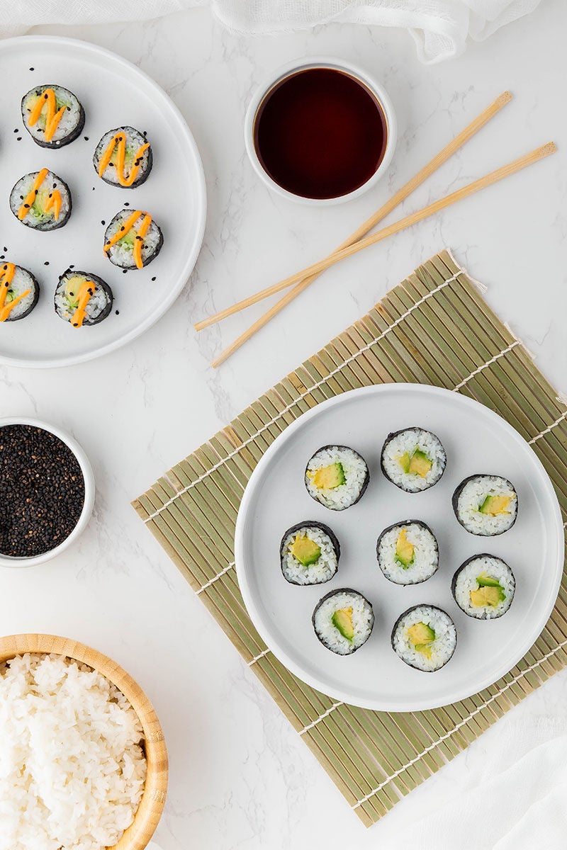 sushi and chopsticks on table