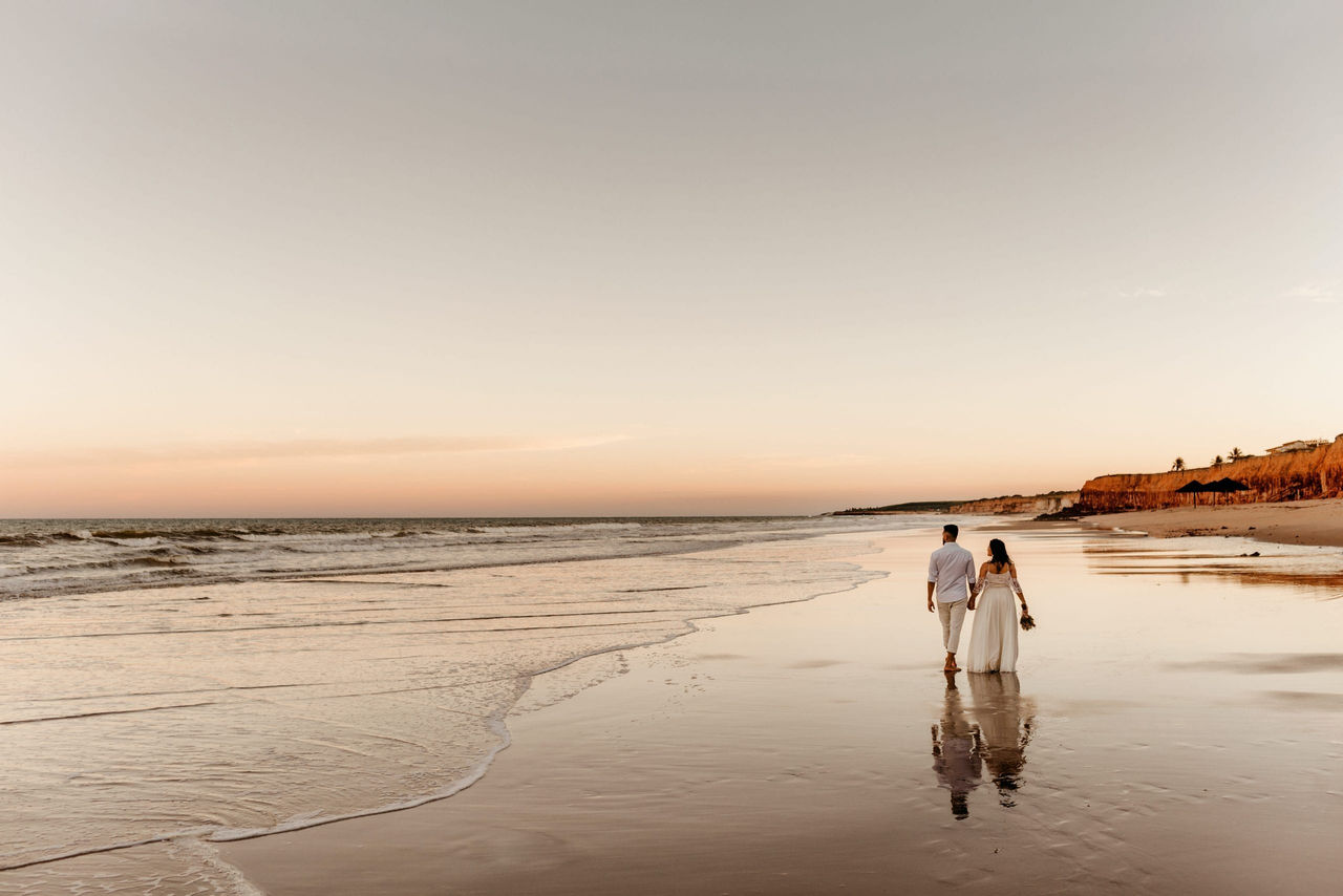 wedding couple on the beach at sunset