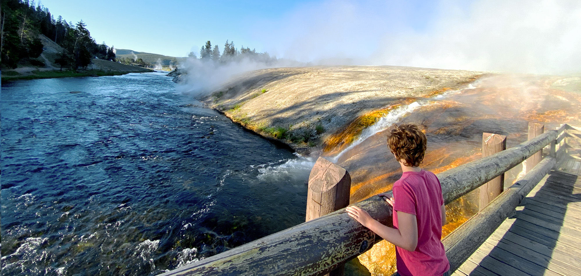 visitor at river geyser